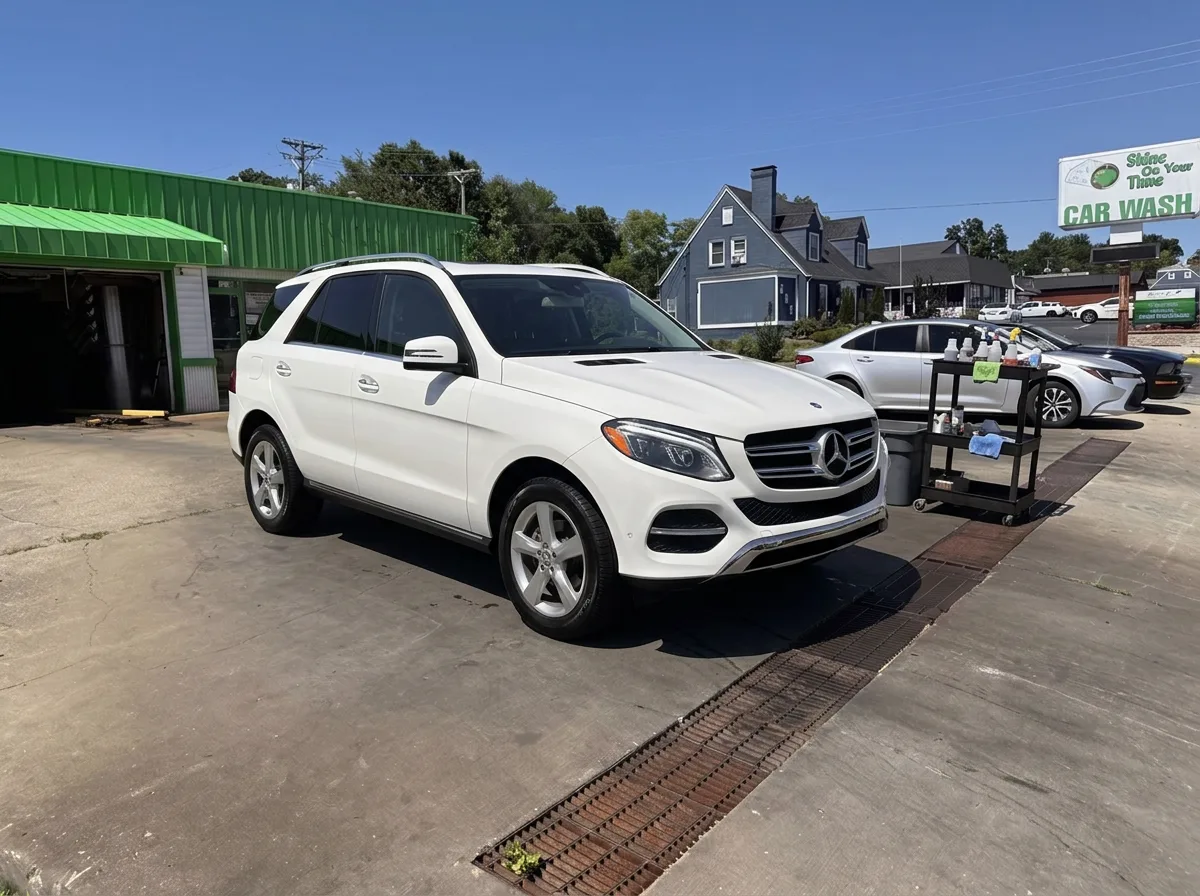 White SUV · showroom gloss