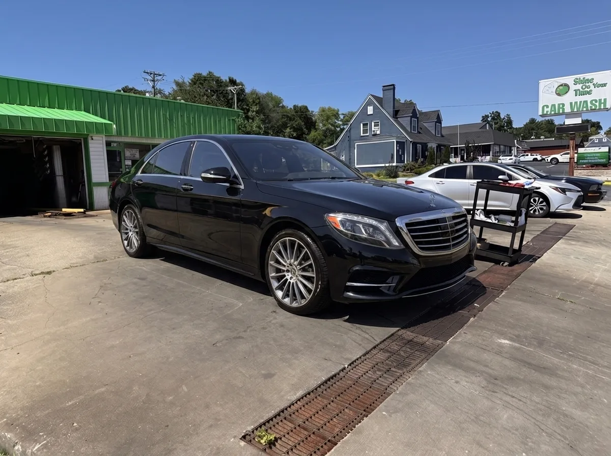 Black sedan · luxury detail